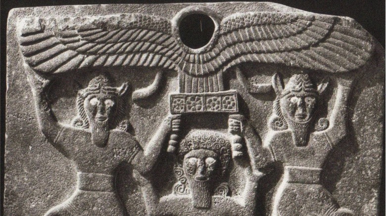 Carving of Gilgamesh with demigods