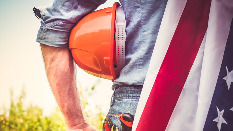Laborer with U.S. flag