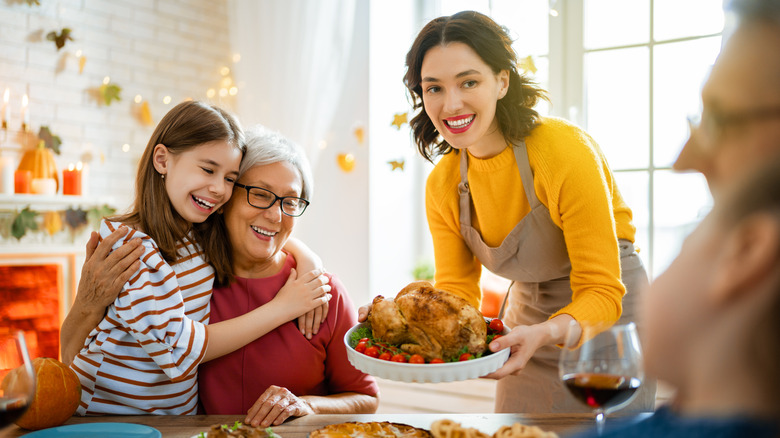 Family having Thanksgiving dinner