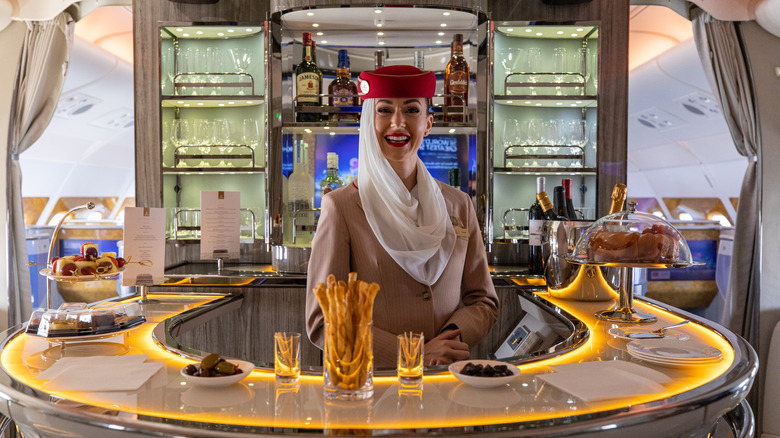 Smiling Dubai Air flight attendant