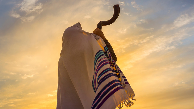 blowing the shofar during Jewish feast