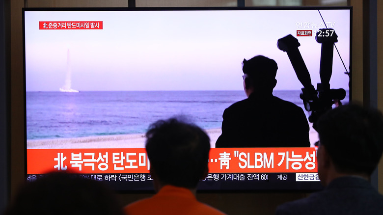 South Koreans watch a 2019 report