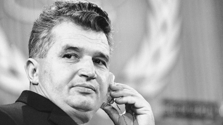 Nicolae Ceausescu listening to earpiece