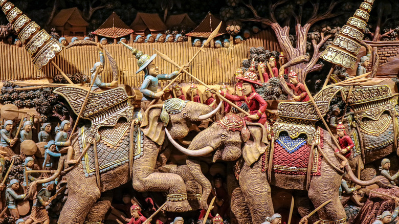 Burmese wood sculpture of war elephants