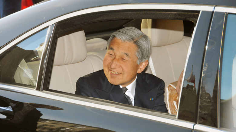 Emperor Akihito greeting a crowd