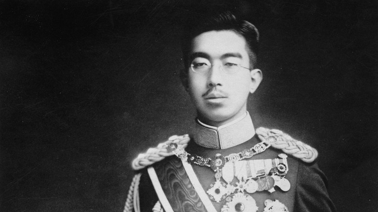 Emperor Hirohito posing for a photo