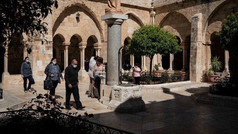 Palestinian Christians heading to Easter liturgy