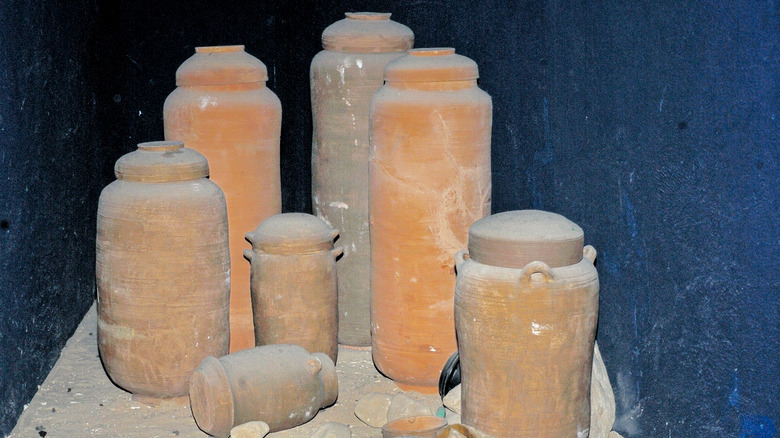 Replicas of clay jars containing scrolls