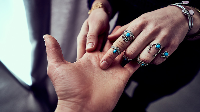 palm reader reads fortune