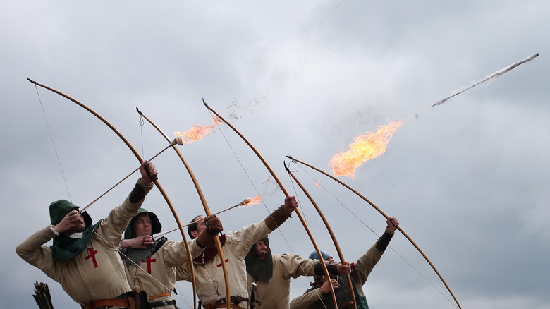 English long-bowmen shooting fire arrows