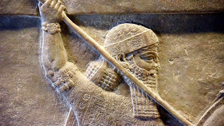 Assyrian king Ashurbanipal II, detail of a lion-hunt scene from the North Palace at Ninevah, Iraq. 8th century BCE