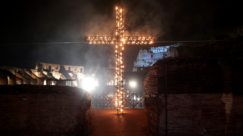 cross lit with candles celebration of Jesus Christ's resurrection. 