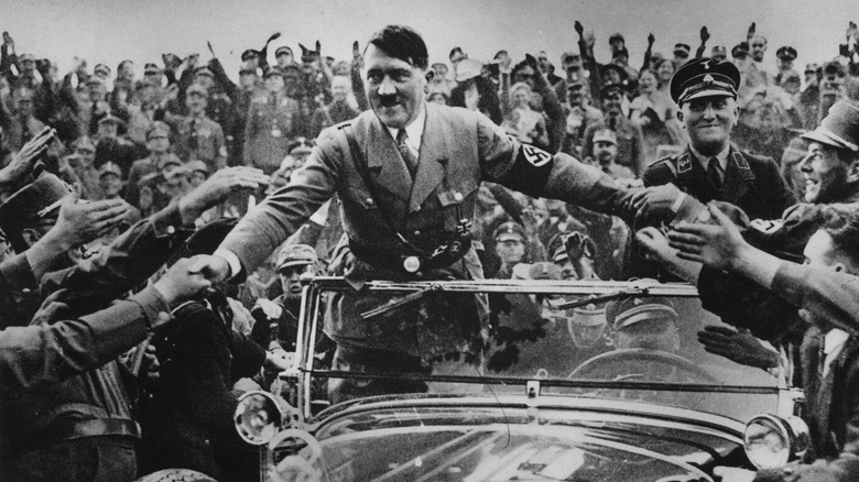 Hitler greeting supporters