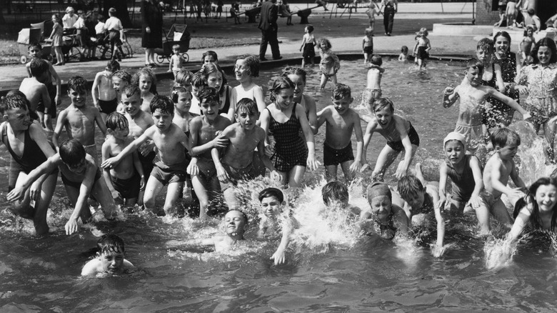 Children splashing in a pool
