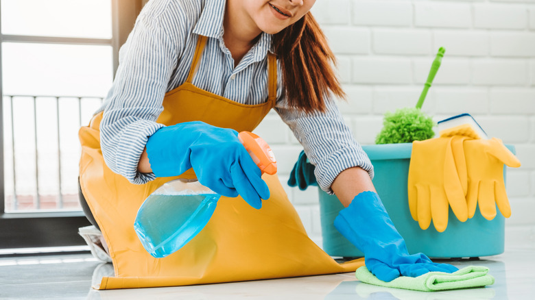 woman on the floor cleaning