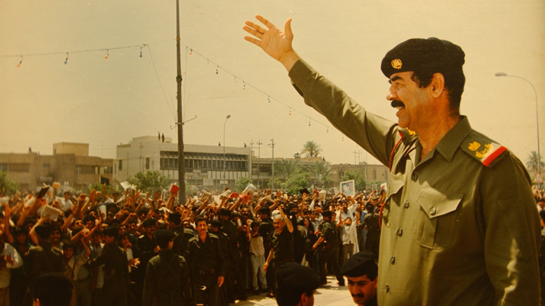 Saddam Hussein waving in Baghdad