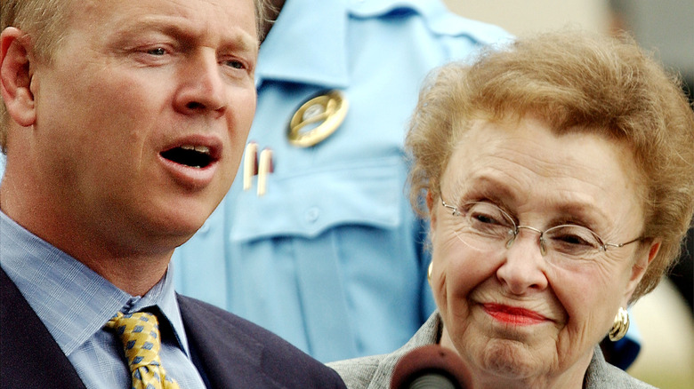 John and Dorthy Moxley talking to the press