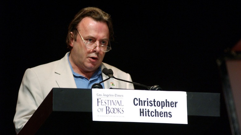 Christopher Hitchens speaking at podium