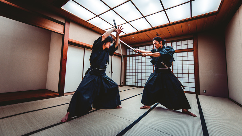 katana sword fight in dojo