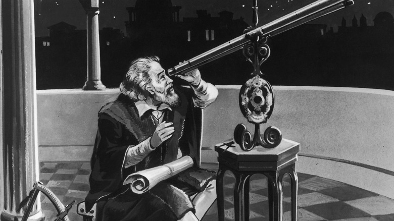 Galileo Galilei sitting at telescope