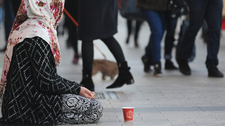 homeless woman in paris