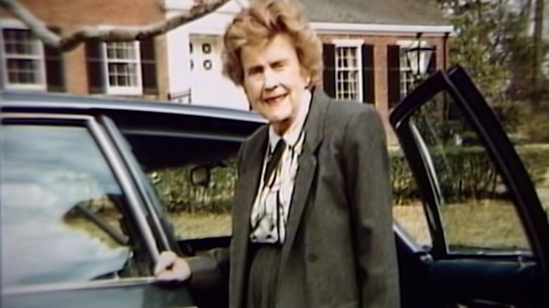 Annie Laurie Hearin standing by a car