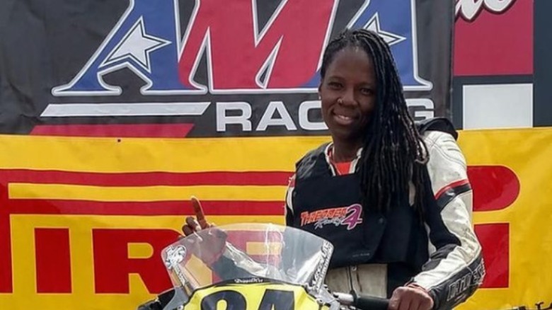 Joi SJ Harris with Motorbike