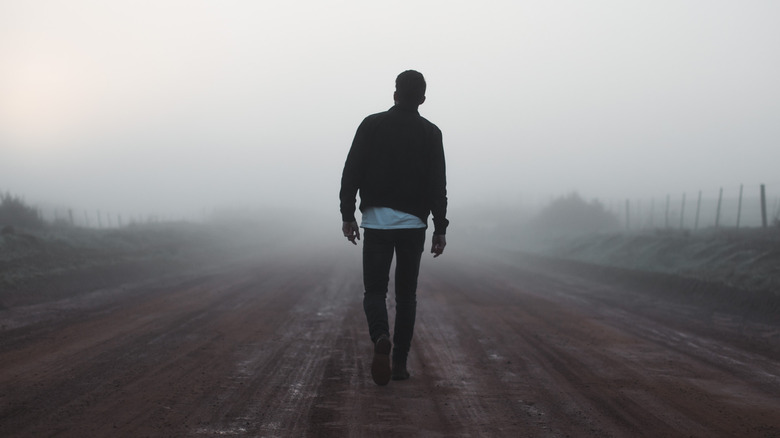 Man alone on road