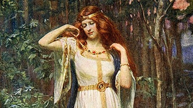 Freya holding a necklace