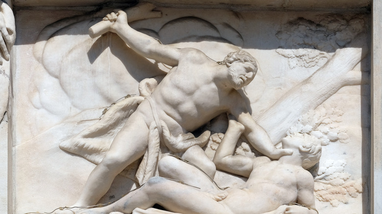 carving depicting cain & abel