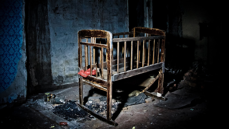 abandoned empty crib