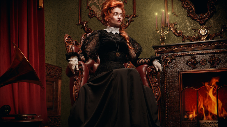 Victorian woman sitting on chair