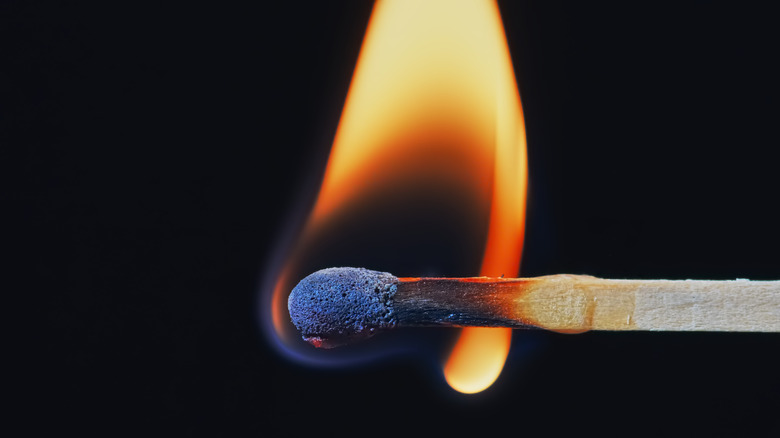 close-up of a burning match