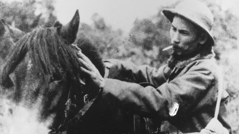 Ho Chi Minh aside a horse