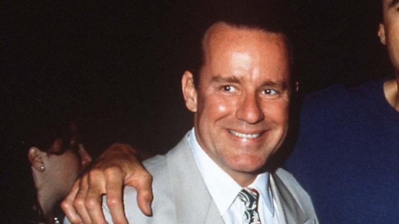 Phil Hartman smiling with friend
