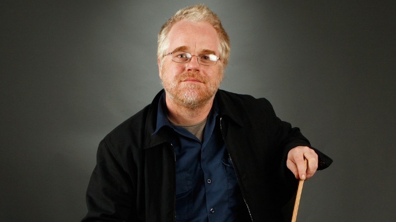 Philip Seymour Hoffman smiling with cane