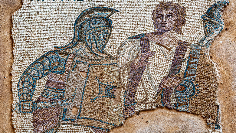 Mosaic of a referee interrupting a gladiatorial competition