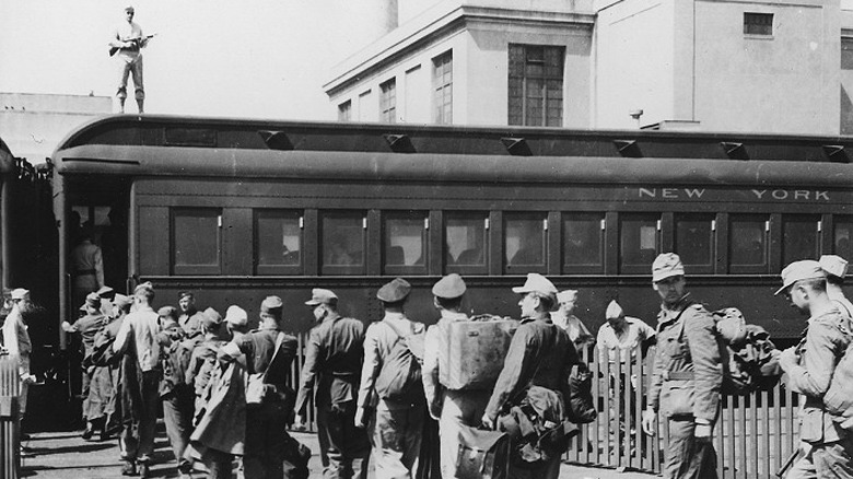 Afrika Korps POWs boarding train in Boston