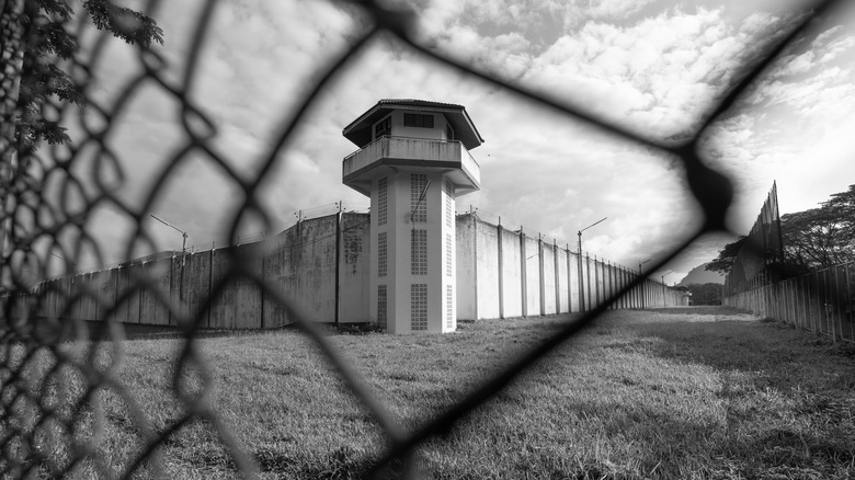 Prison behind fence
