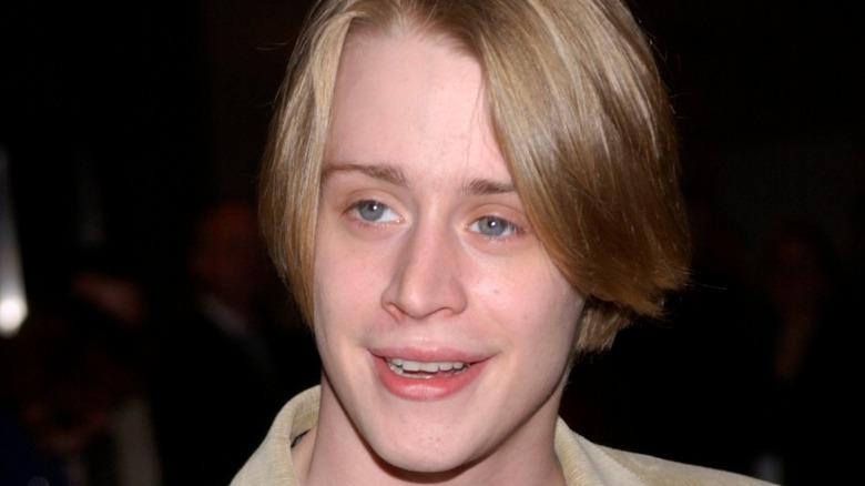 Macaulay Culkin hands on 