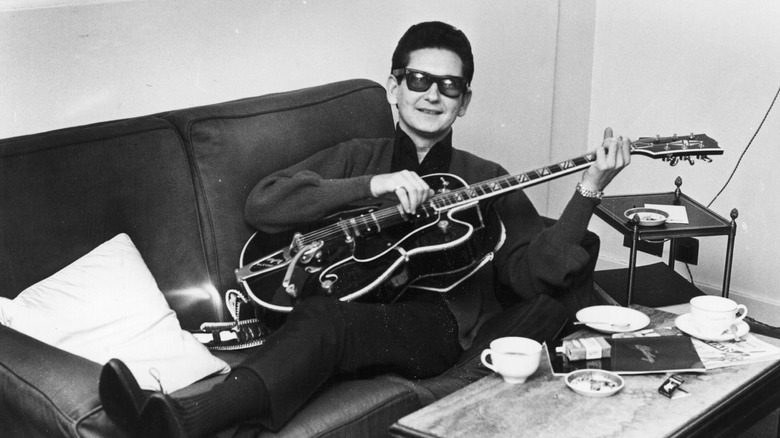 Orbison plays guitar