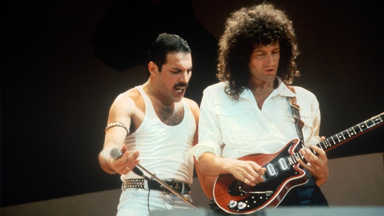 Brian May and Freddie Mercury performing