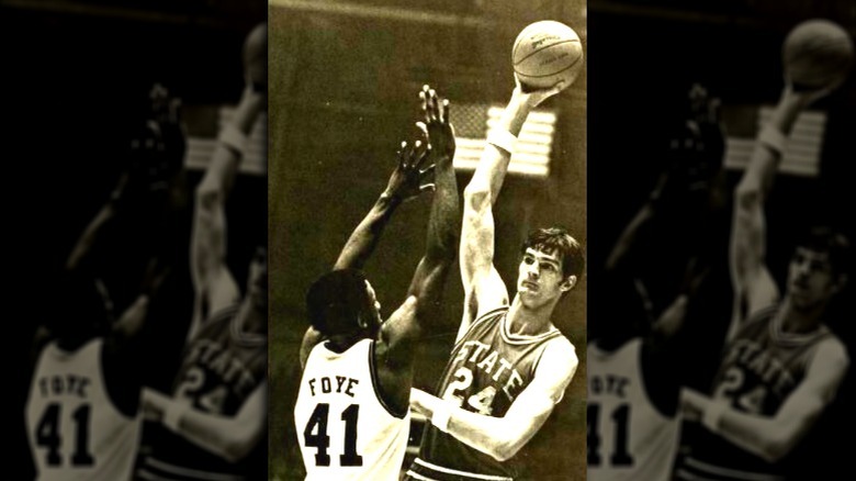 Team USA center playing basketball in college