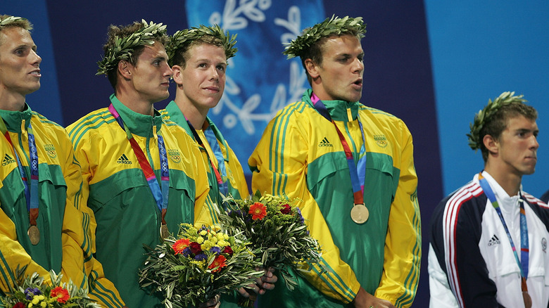 Michael Phelps looking sad on the podium in 2004