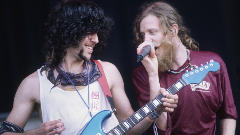 Eric Schenkman and Chris Barron onstage