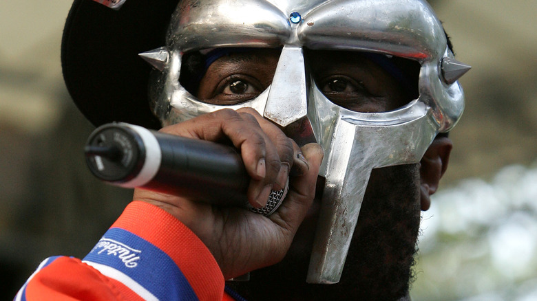 MF DOOM on stage with mic