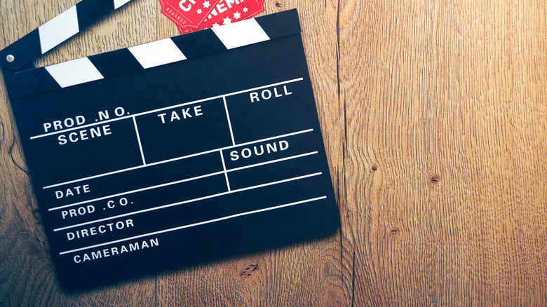 Clapperboard on wooden background