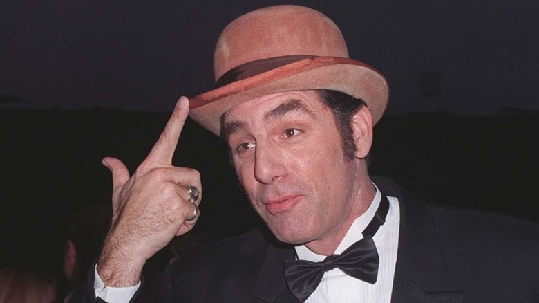 Michael Richards touching hat