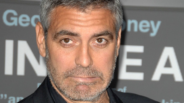 George Clooney frowning