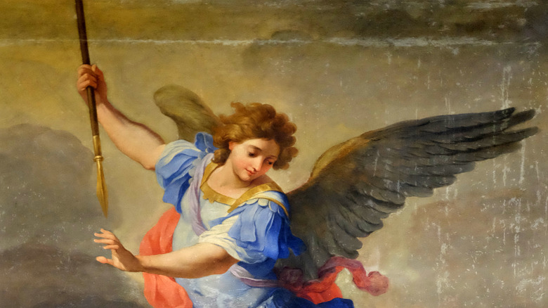 The archangel Michael spears Satan